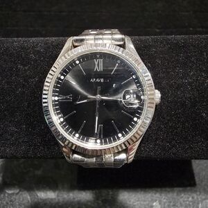 Caravelle By Bulova Women's 43M115 Watch Silver Tone Date Round Black Dial